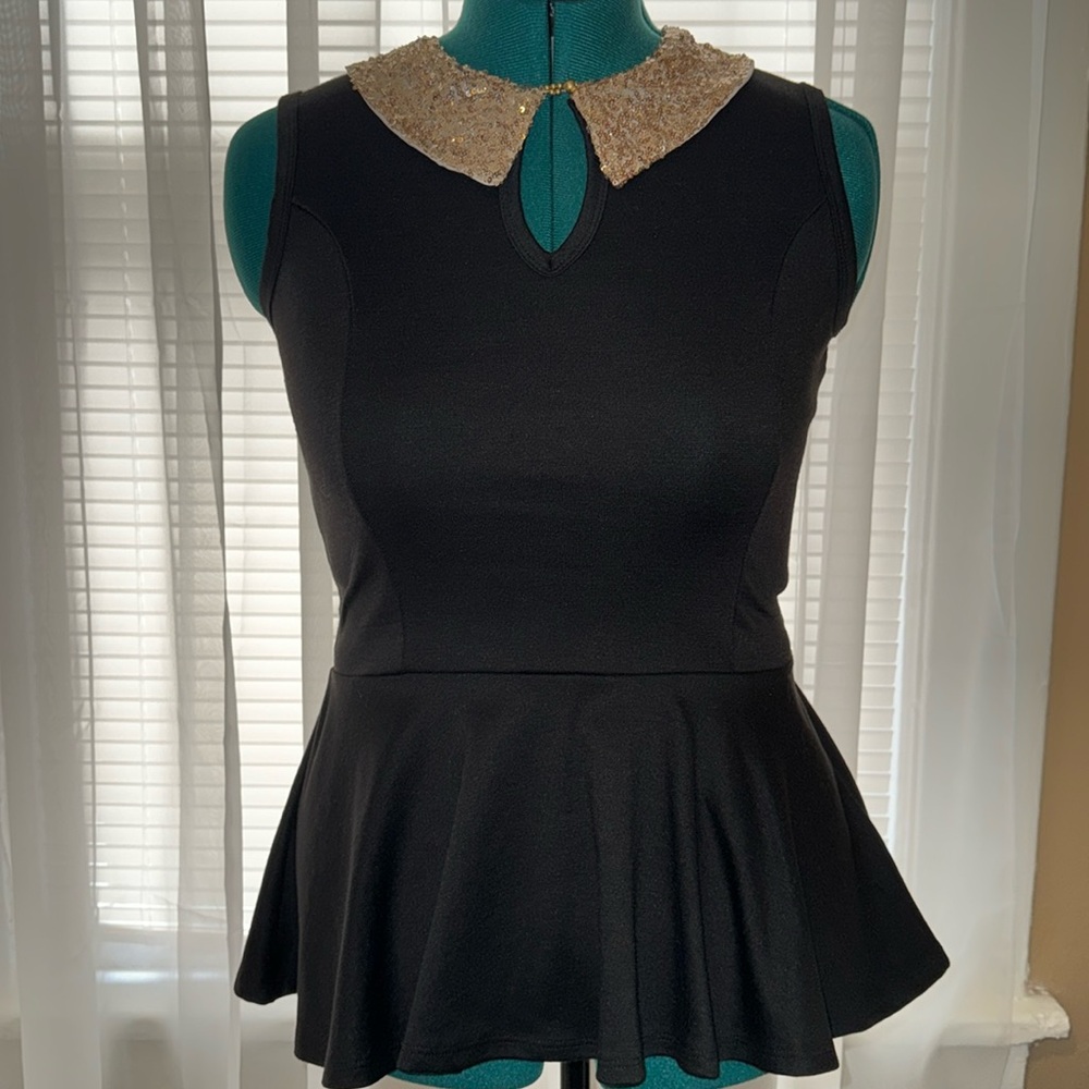 Peplum sleeveless top